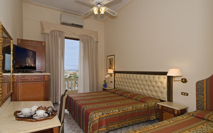 Imagen de la habitación del Hotel Villa Tina, Viareggio. Foto 10