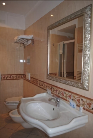 Imagen de la habitación del Hotel Villa Tina, Viareggio. Foto 16