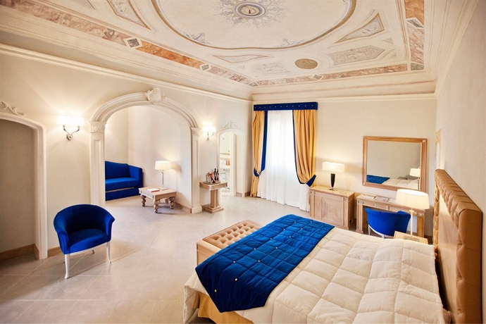 Imagen de la habitación del Hotel Villa Tolomei Hotel y Resort. Foto 6