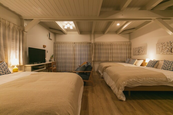 Imagen de la habitación del Hotel Villa Toma East. Foto 32