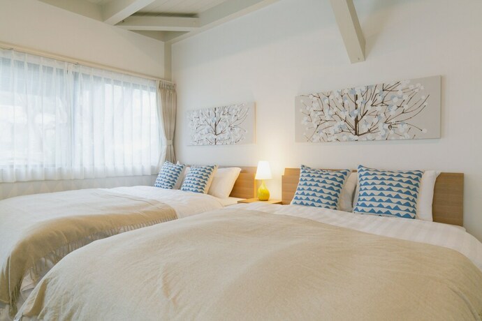 Imagen de la habitación del Hotel Villa Toma East. Foto 33