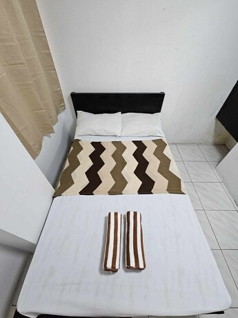 Imagen de la habitación del Hotel Villa Tomasa Boracay DMALL. Foto 13