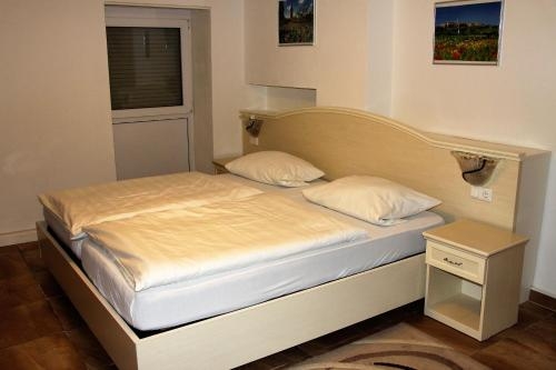 Imagen de la habitación del Hotel Villa Toscana, Gersthofen. Foto 8