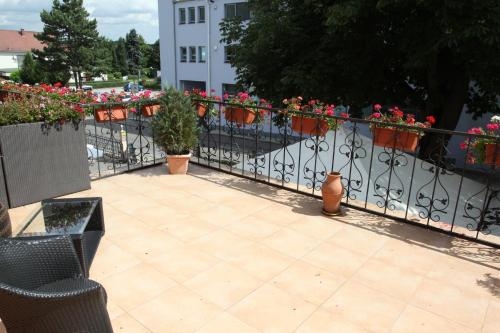 Imagen de la habitación del Hotel Villa Toscana, Gersthofen. Foto 9