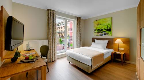 Imagen de la habitación del Hotel Villa Toskana. Foto 10