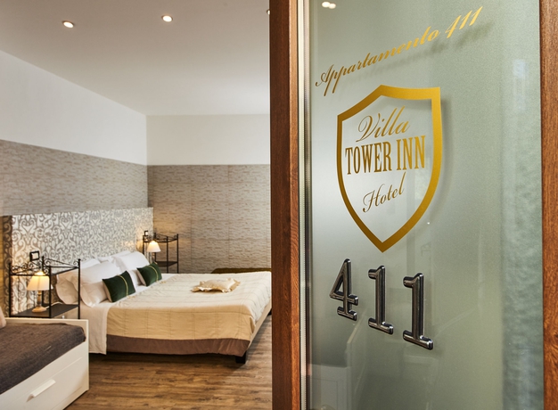 Imagen de la habitación del Hotel Villa Tower Inn. Foto 15