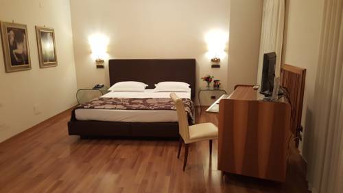 Imagen de la habitación del Hotel Villa Traiano. Foto 10