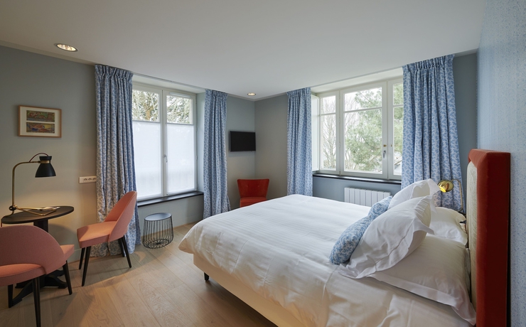 Imagen de la habitación del Hotel Villa Tri Men. Foto 7