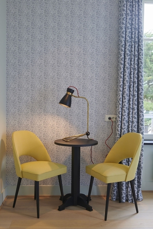 Imagen de la habitación del Hotel Villa Tri Men. Foto 8