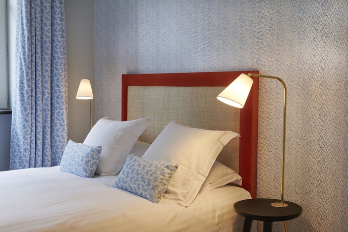 Imagen de la habitación del Hotel Villa Tri Men. Foto 10