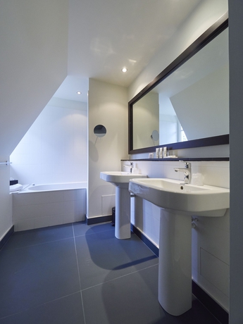 Imagen de la habitación del Hotel Villa Tri Men. Foto 14