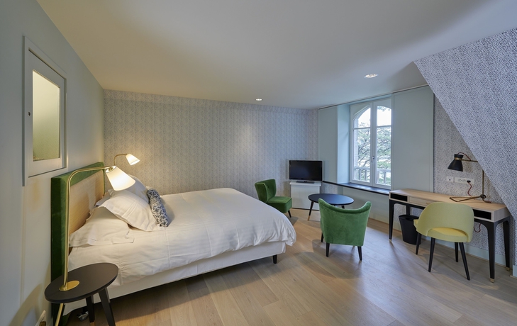 Imagen de la habitación del Hotel Villa Tri Men. Foto 15