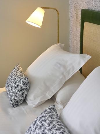 Imagen de la habitación del Hotel Villa Tri Men. Foto 17