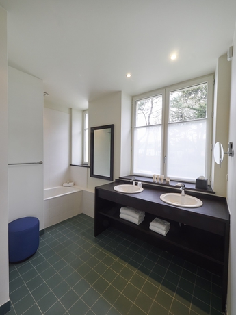 Imagen de la habitación del Hotel Villa Tri Men. Foto 19