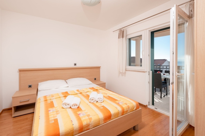 Imagen de la habitación del Hotel Villa Tucepi Apartments. Foto 2