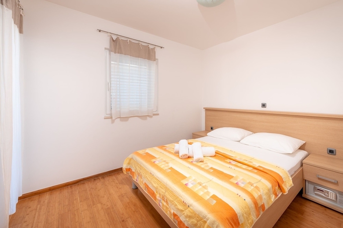 Imagen de la habitación del Hotel Villa Tucepi Apartments. Foto 4