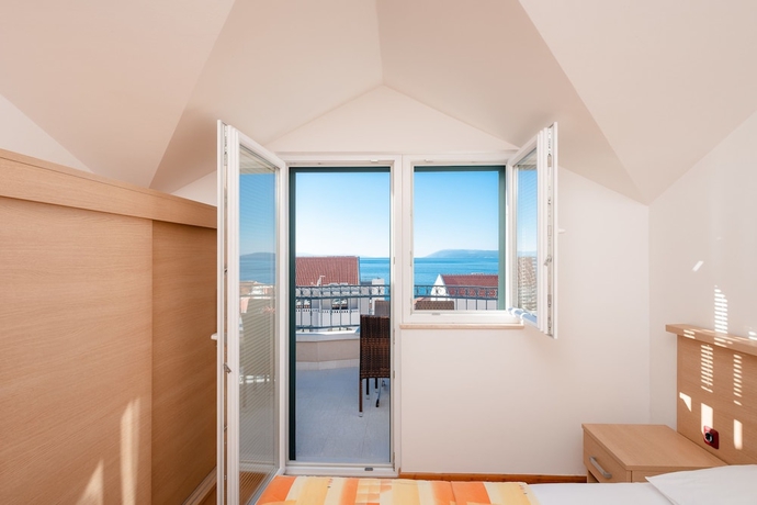 Imagen de la habitación del Hotel Villa Tucepi Apartments. Foto 6