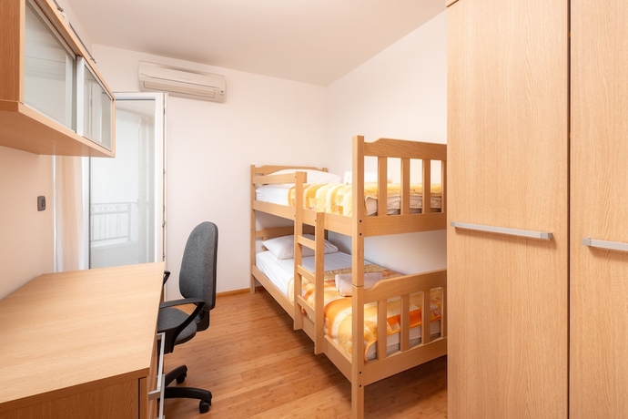 Imagen de la habitación del Hotel Villa Tucepi Apartments. Foto 8