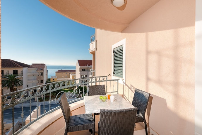 Imagen de la habitación del Hotel Villa Tucepi Apartments. Foto 9