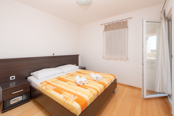 Imagen de la habitación del Hotel Villa Tucepi Apartments. Foto 10