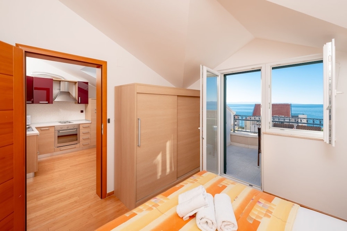 Imagen de la habitación del Hotel Villa Tucepi Apartments. Foto 11