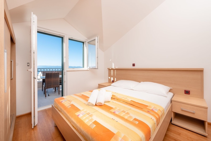 Imagen de la habitación del Hotel Villa Tucepi Apartments. Foto 12