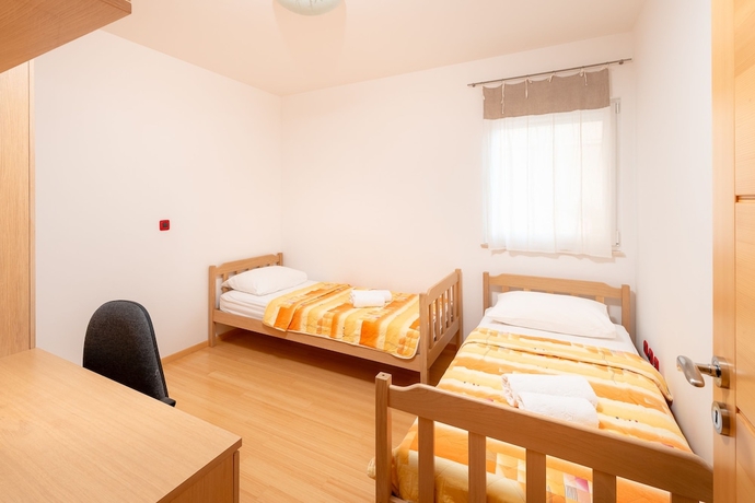 Imagen de la habitación del Hotel Villa Tucepi Apartments. Foto 14