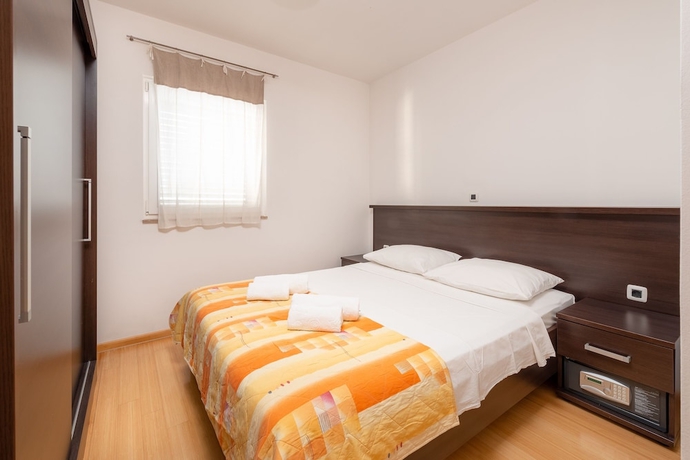 Imagen de la habitación del Hotel Villa Tucepi Apartments. Foto 16