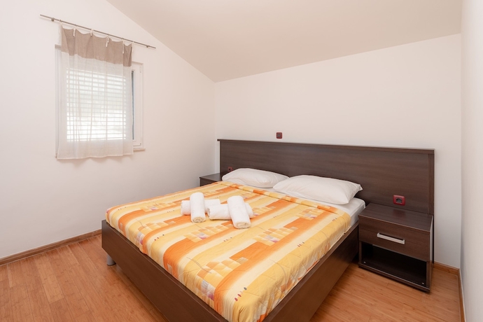 Imagen de la habitación del Hotel Villa Tucepi Apartments. Foto 18