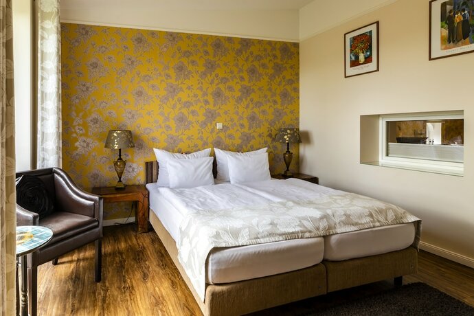 Imagen de la habitación del Hotel Villa Ulmenhof. Foto 15