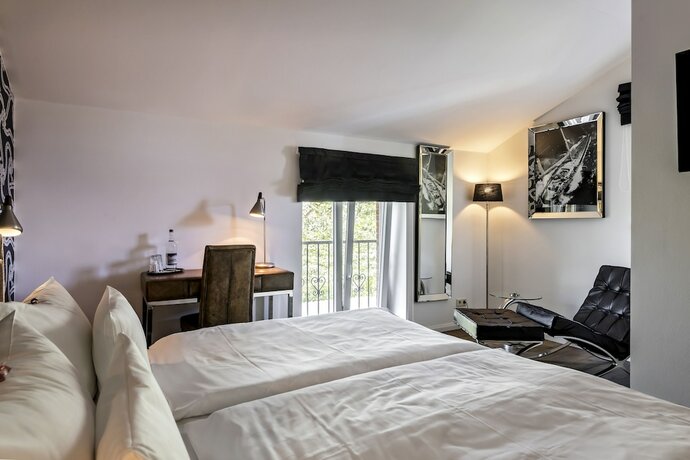 Imagen de la habitación del Hotel Villa Ulmenhof. Foto 18