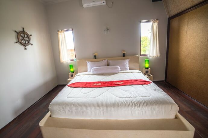 Imagen de la habitación del Hotel Villa Umbrella. Foto 19