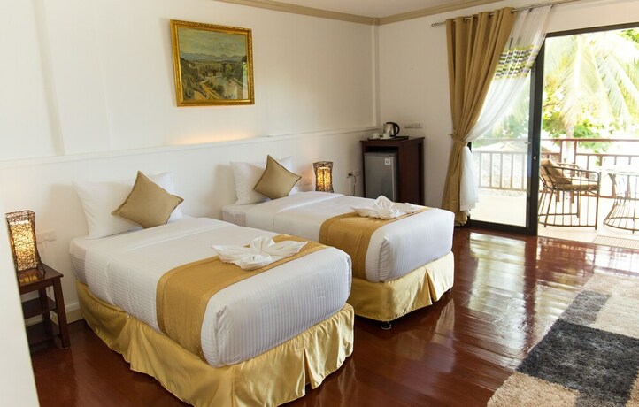 Imagen de la habitación del Hotel Villa Umi Panglao Resort. Foto 19