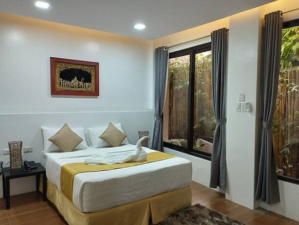 Imagen de la habitación del Hotel Villa Umi Panglao Resort. Foto 36