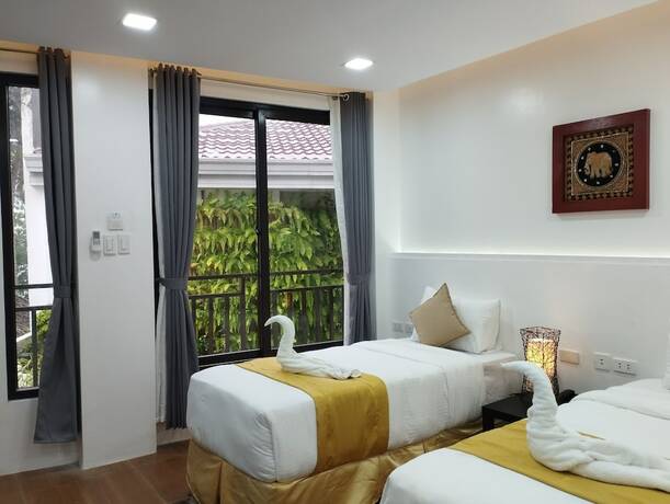 Imagen de la habitación del Hotel Villa Umi Panglao Resort. Foto 39