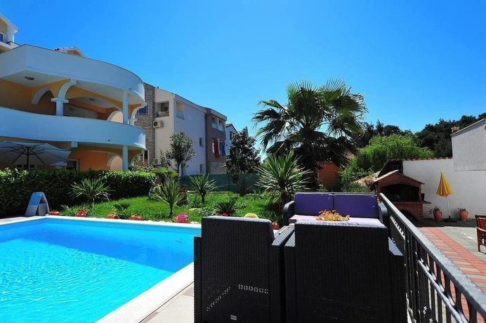 Imagen de la piscina del Hotel Villa Vanilla. Foto 16