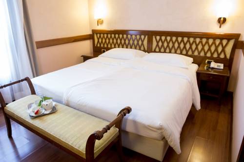 Imagen de la habitación del Hotel Villa Venezia. Foto 6