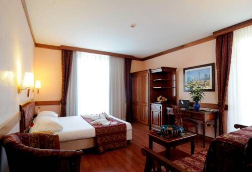 Imagen de la habitación del Hotel Villa Venezia. Foto 12