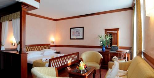 Imagen de la habitación del Hotel Villa Venezia. Foto 14