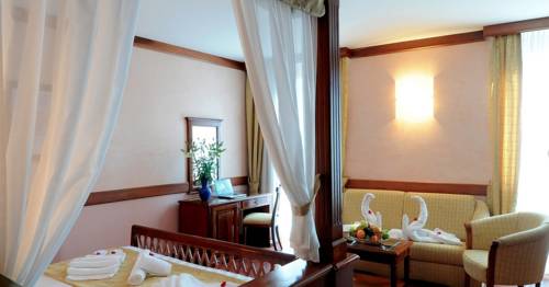 Imagen de la habitación del Hotel Villa Venezia. Foto 15