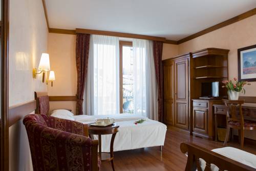 Imagen de la habitación del Hotel Villa Venezia. Foto 16