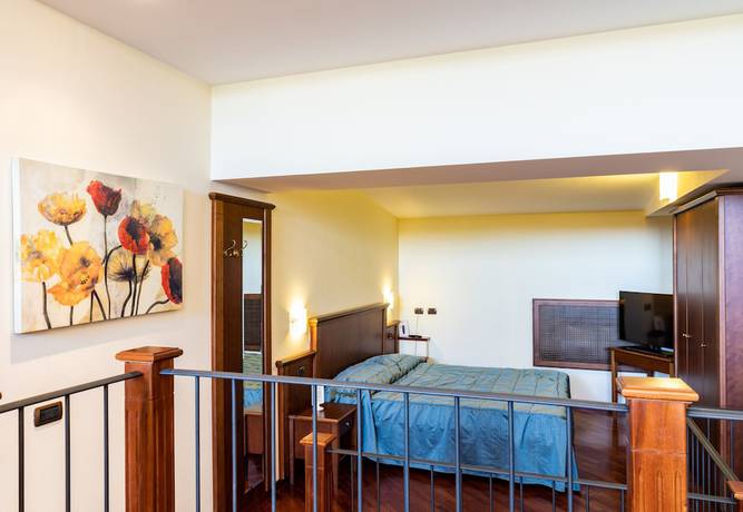 Imagen de la habitación del Hotel Villa Venus. Foto 12