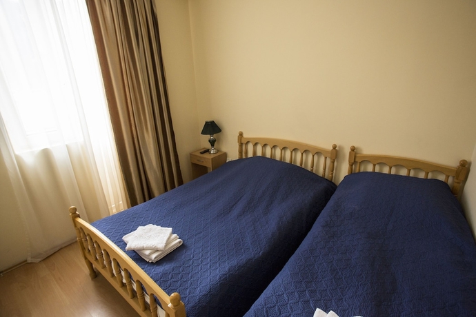 Imagen de la habitación del Hotel Villa Vita Bakuriani. Foto 7