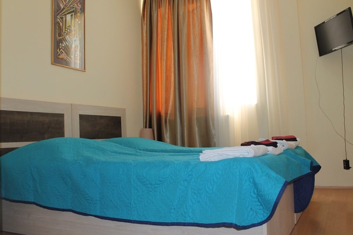 Imagen de la habitación del Hotel Villa Vita Bakuriani. Foto 10