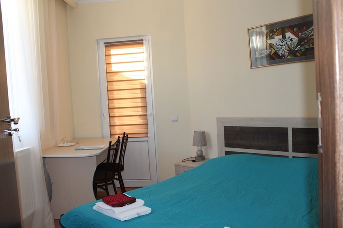 Imagen de la habitación del Hotel Villa Vita Bakuriani. Foto 11