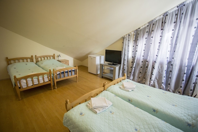 Imagen de la habitación del Hotel Villa Vita Bakuriani. Foto 13