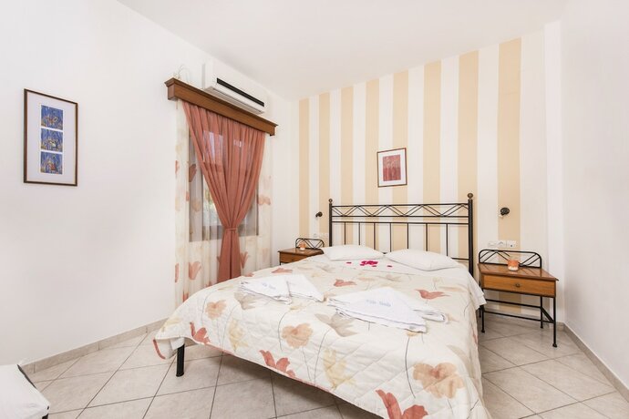 Imagen de la habitación del Hotel Villa Voula, Santorini. Foto 16