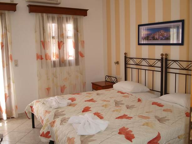 Imagen de la habitación del Hotel Villa Voula, Santorini. Foto 19