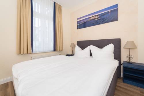 Imagen de la habitación del Hotel Villa Waldfrieden. Foto 4