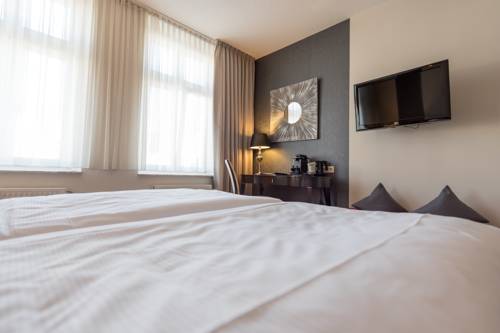 Imagen de la habitación del Hotel Villa Waldfrieden. Foto 6